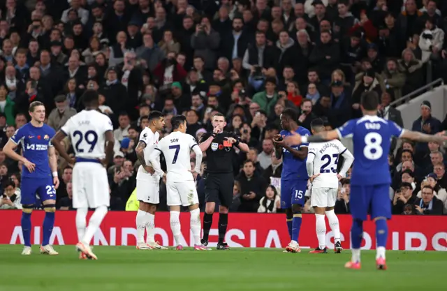 Michael Oliver sends off Cristian Romero after VAR review