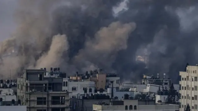 Smoke rises in the northern Gaza Strip after Israeli air strikes on Thursday