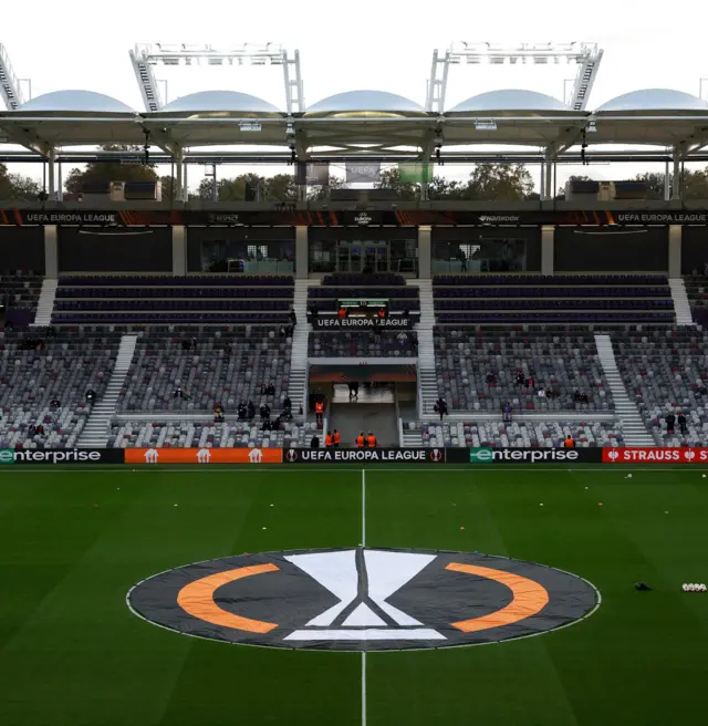 The Europa league banner sits in the middle of the pitch in Toulouse.