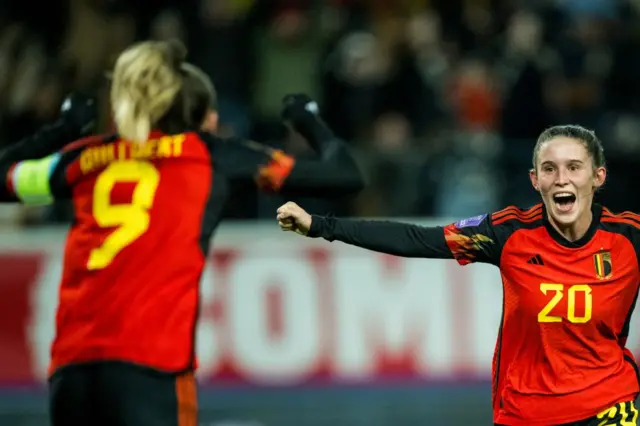 Belgium's Tessa Wullaert and Marie Detruyer celebrates after scoring during a soccer match between Belgium's national women's team the Red Flames and Scotland