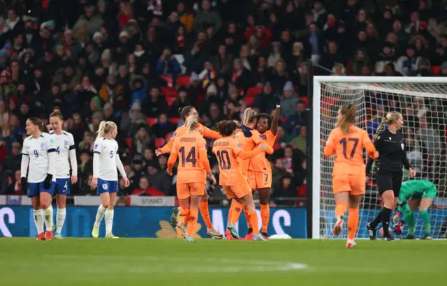 Beerensteyn is congratulated by her teammates as England are stunned.