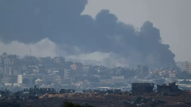 Smoke rises over Gaza following an Israeli strike, after a temporary truce between Israel and Hamas expired