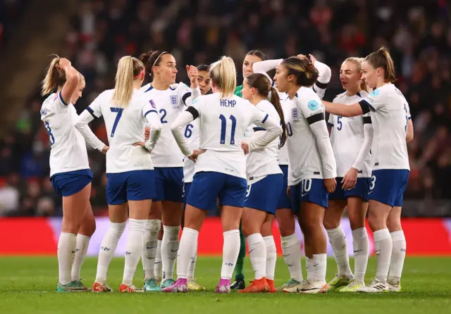 England players chat on the pitch after going behind.