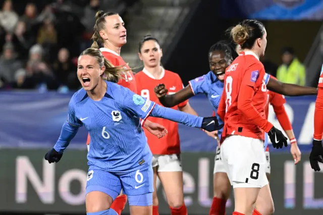 France's defender #06 Amandine Henry (L) celebrates scoring her team's first goal during the UEFA Women's Nations League group 2 football match between France and Austria at the Roazhon Park in Rennes