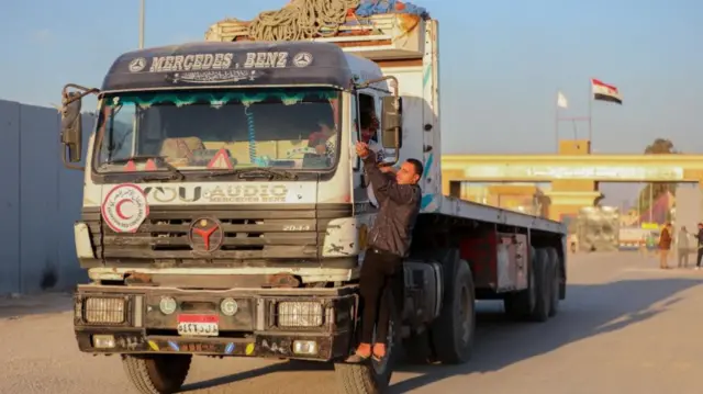 A truck, marked with Egyptian Red Crescent logo, crossed into Egypt from Gaza, at the Rafah border crossing during last week's truce