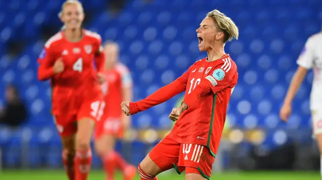 Jess Fishlock celebrates a goal for Wales