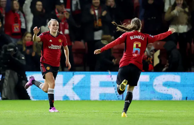 Ella Toone of Manchester United celebrates with Hannah Blundell