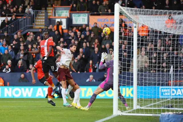 Elijah Adebayo scores