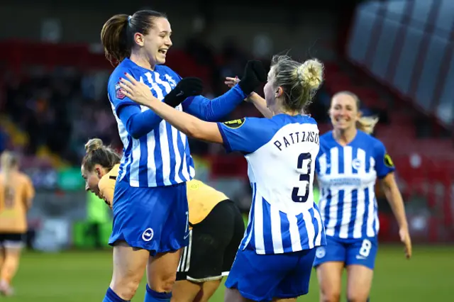 Elisabeth Terland of Brighton & Hove Albion celebrates with teammates after scoring