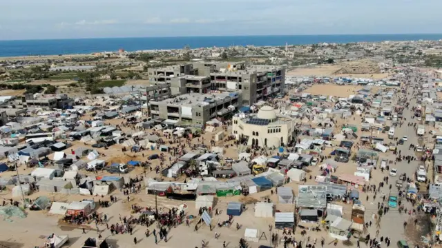 A high-angle view of camp in Rafah where displaced Palestinians are sheltering