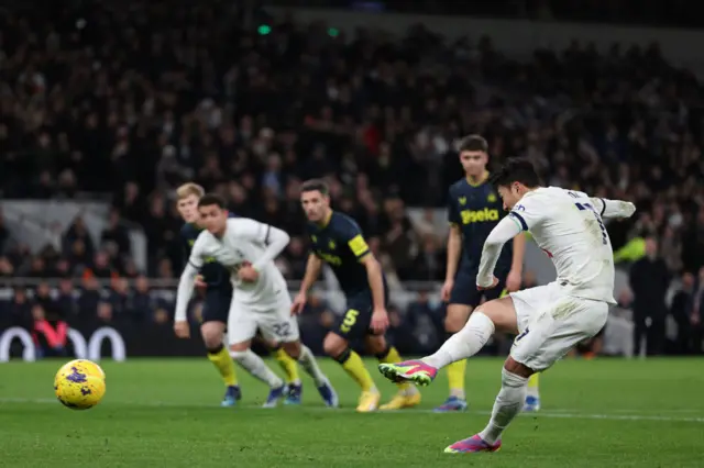 Son Heung-Min scores their fourth goal from the penalty spot