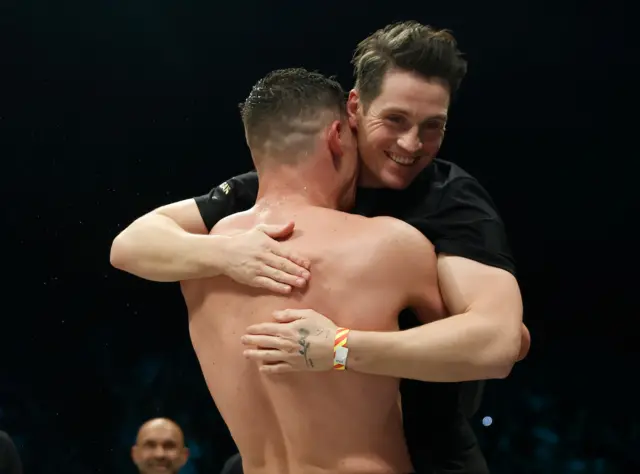 Chris Billam-Smith hugs trainer Shane McGuigan