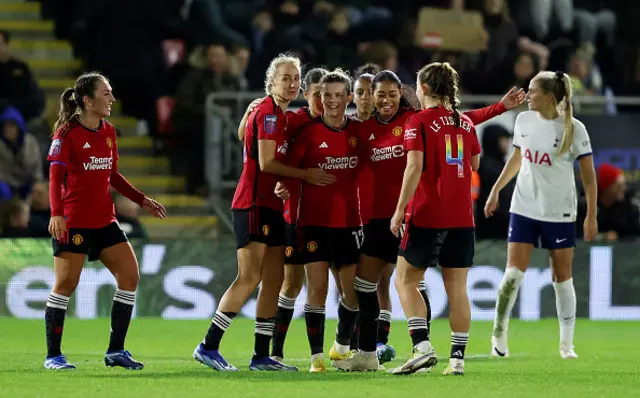 Hayley Ladd of Manchester United celebrates with teammates