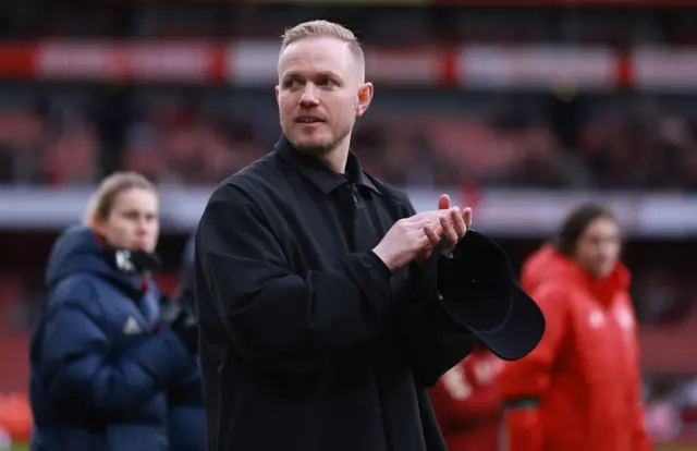 Jonas Eidevall claps the Arsenal fans