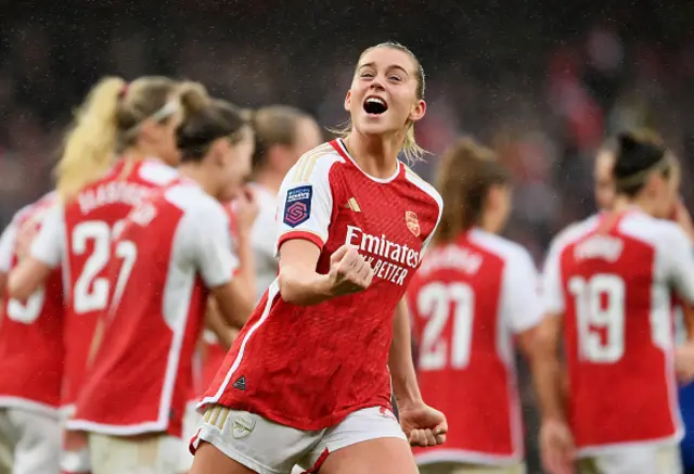 Alessia Russo of Arsenal celebrates with teammates scoring their team's fourth goal from the penalty spot