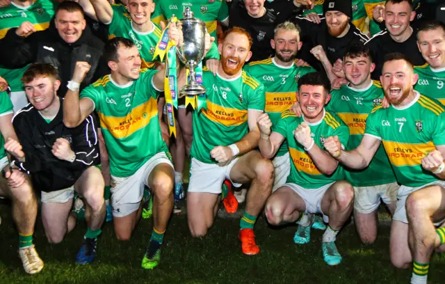 : Conor Glass celebrates with the trophy after the game