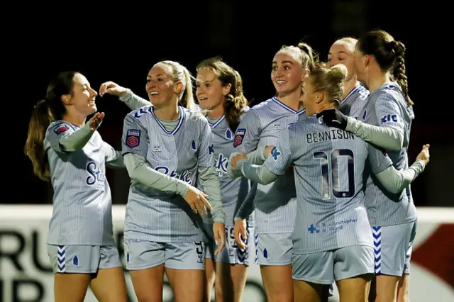 Karen Holmgaard of Everton (obscured) celebrates with teammates after scoring their team's first goal during the Barclays Women's Super League match between West Ham United and Everton FC