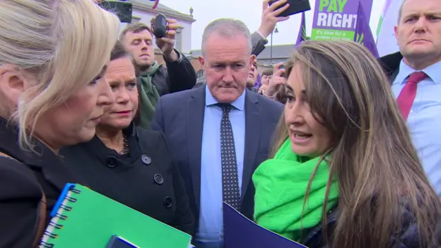 Protestor confronts Sinn Féin delegation