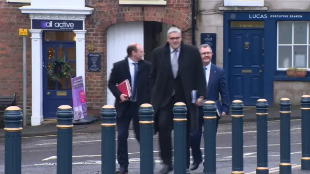 Gordon Lyons, Gavin Robinson and Sir Jeffrey Donaldson arrive to Hillsborough