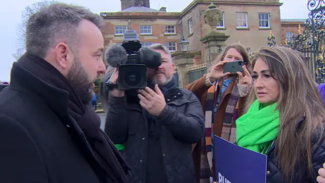 Colum Eastwood and health protesters