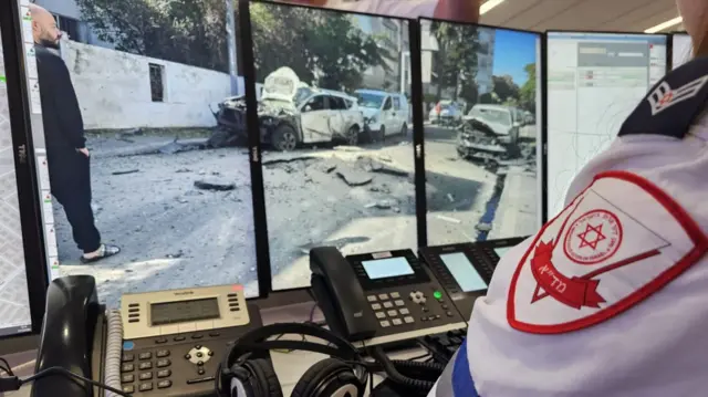 Photo supplied by Israel's Magen David Adom ambulance service showing aftermath of a rocket attack in Holon, central Israel