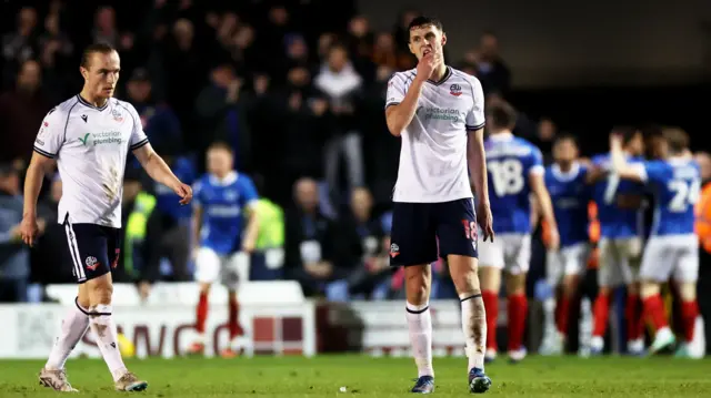 Bolton players against Portsmouth