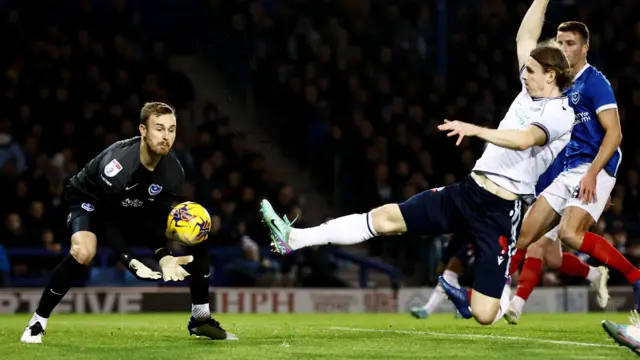 Bolton have a shot against Portsmouth