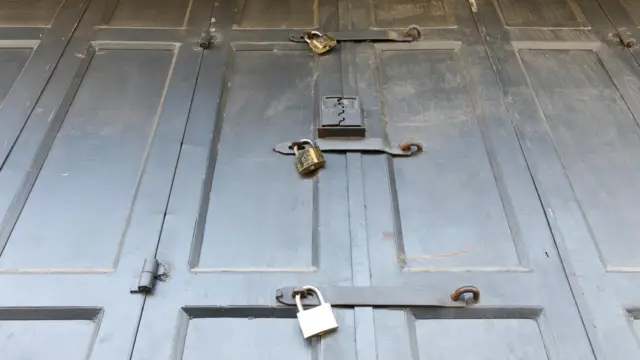 A closed shop front in Hebron