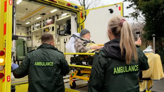 Patient loaded into ambulance