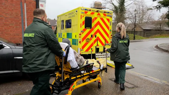 Patient heads into ambulance