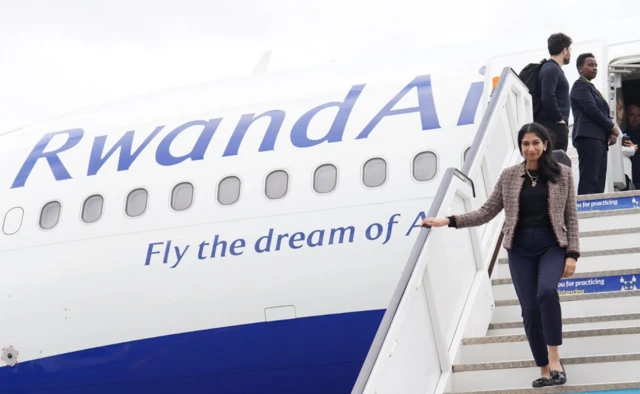 Home Secretary Suella Braverman disembarks her plane as she arrives at Kigali International Airport for her visit to Rwanda. Picture date: Saturday March 18, 2023.