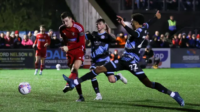 Luca Colville (left) scores for Scarborough Athletic against Forest Green