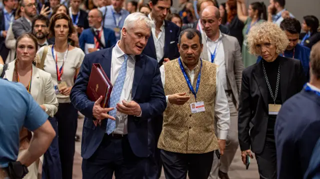 United Kingdom's Minister of State for Energy Security and Net Zero, and delegates arrive for continuing negotiations during the 2023 United Nations Climate Change Conference (COP28), in Dubai, United Arab Emirates, 11 December 2023. The 2023 United Nations Climate Change Conference (COP28), runs from 30 November to 12 December, and is expected to host one of the largest number of participants in the annual global climate conference as over 70,000 estimated attendees, including the member states of the UN Framework Convention on Climate Change (UNFCCC), business leaders, young people, climate scientists, Indigenous Peoples and other relevant stakeholders will attend.