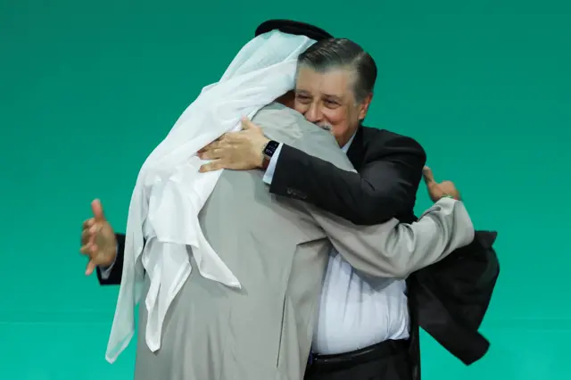 Sultan al-Jaber UAE industry minister hug