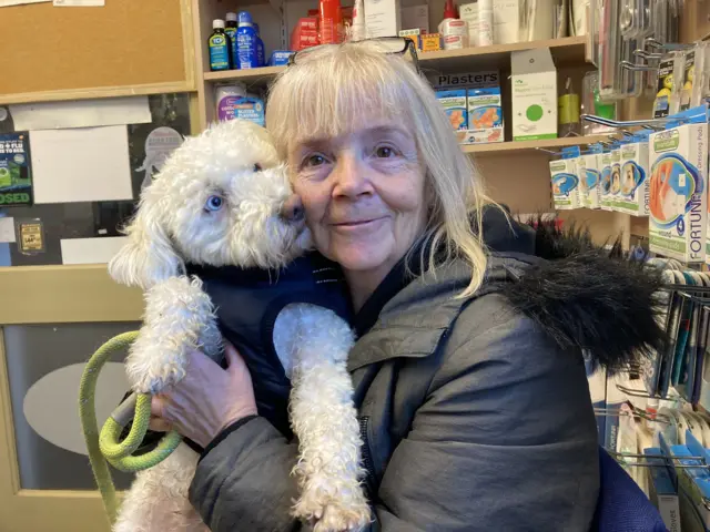 Susan Zerafa and her dog Obie at Hempstead Pharmacy in Gillingham