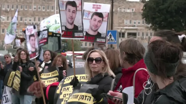 Families of Israelis held hostage in Gaza for 68 days formed a human chain in front of Israel's parliament in Jerusalem on Wednesday, demanding action from the Israeli government and the world to bring about their safe release