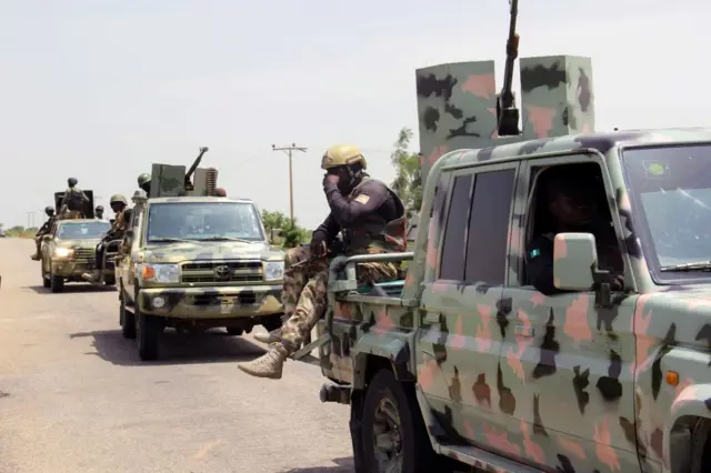 Soldiers sit in trucks as the patrol in Goniri, Yobe State, in Nigeria's restive northeast on July 3, 2019.