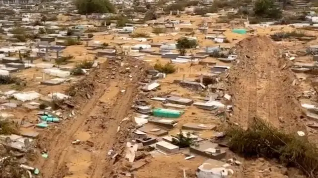 Screengrab of video showing destruction in a graveyard in Gaza