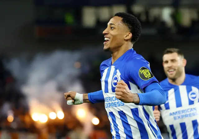 Joao Pedro celebrates after scoring a goal