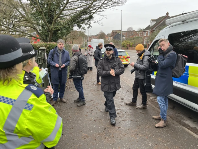 Journalists gathering ahead of a press conference in Norwich