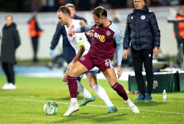 Nemanja Bilbija of Zrinjski in action against Matty Cash of Aston Villa