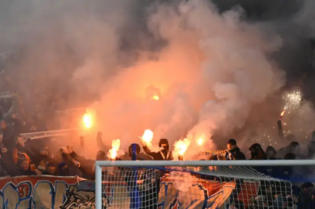 Marseille fans light flares in the stands