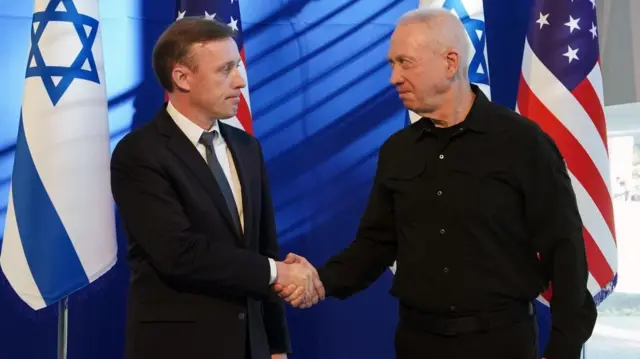 US national security adviser Jake Sullivan shakes hands with Israeli defence minister Yoav Gallant