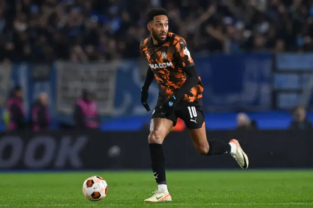 Pierre-Emerick Aubameyang runs with the ball for Marseille