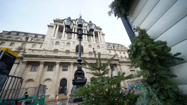 Bank of England in London with Christmas trees in front of it