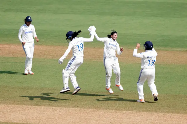 Sneh Rana celebrates wicket