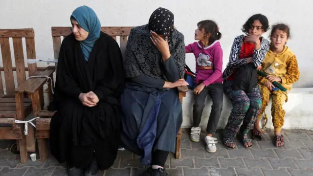 Mourners in Rafah at the funeral of Palestinians killed in Israeli strikes