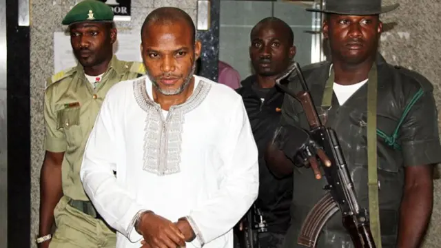 Leader of Indigenous Peoples of Biafra (IPOB), Nnamdi Kanu (C) attends a trial for treasonable felony at the Federal High court in Abuja, on February 9, 2016.