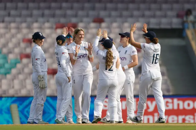 Lauren Bell celebrates wicket