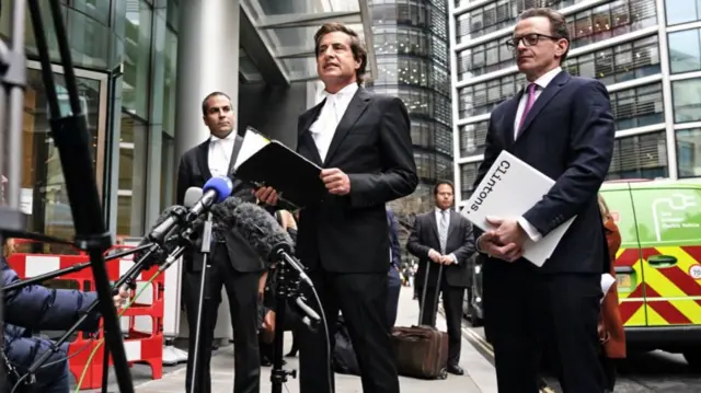 Barrister David Sherborne (centre) reads a statement, on behalf of the Duke of Sussex, outside the Rolls Buildings